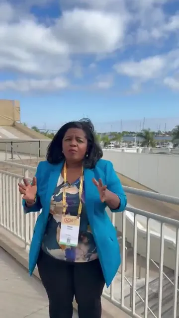 Diane Claxton speaking outdoors, the same recording after audio repair